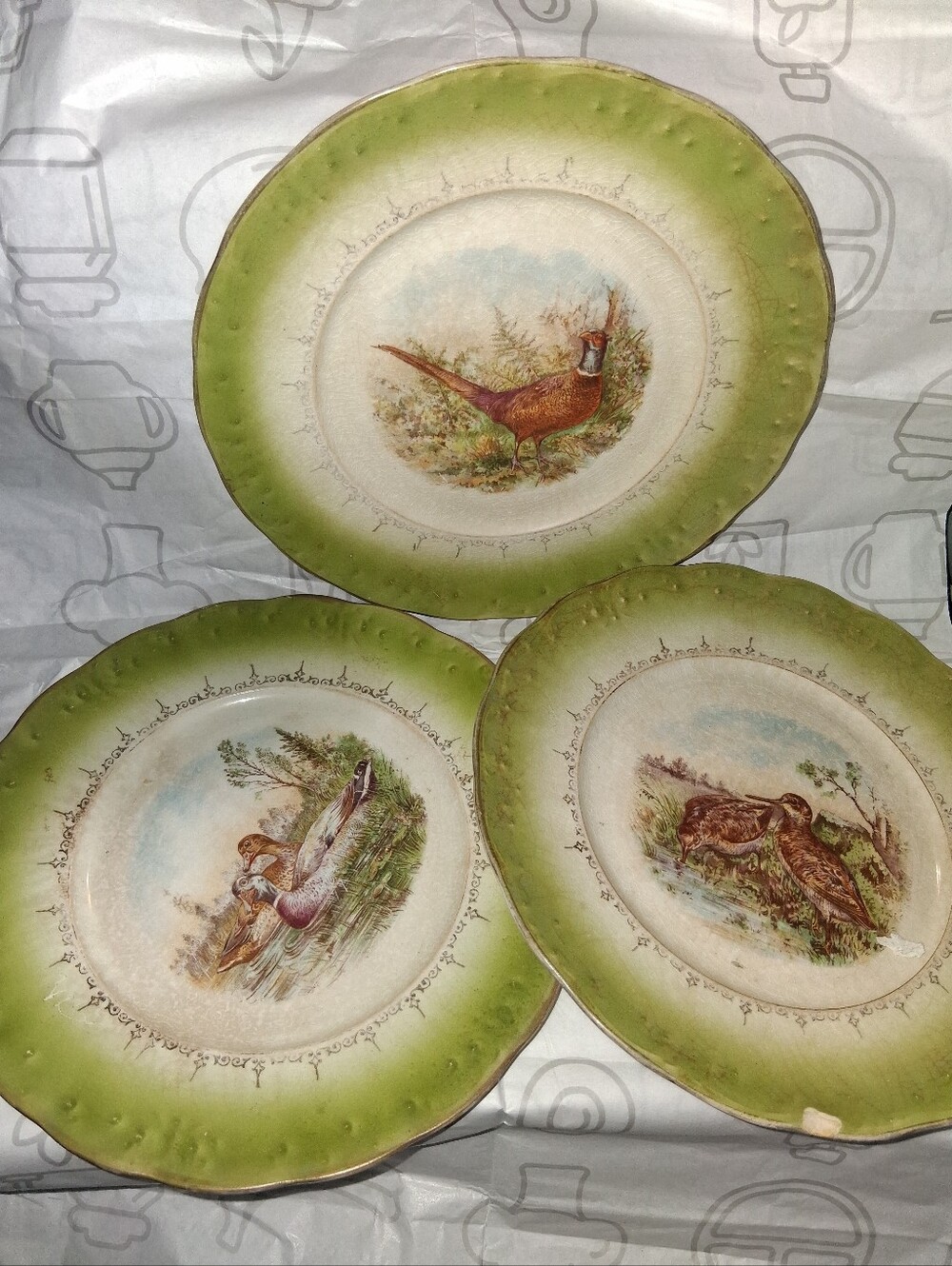 3 VERY VINTAGE AND ELEGANT "LA FRANCAISE" PORCELAIN EMBOSSED PORCELAIN PLATES.